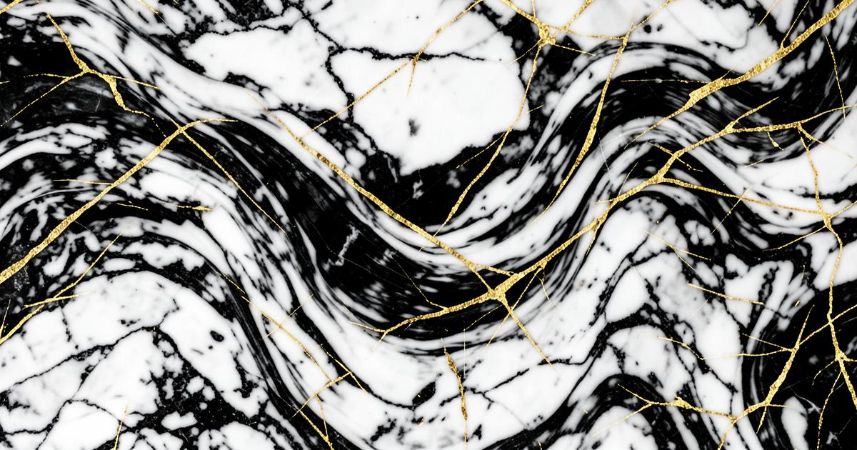 Swirling black and white marble with gold veins representing market volatility